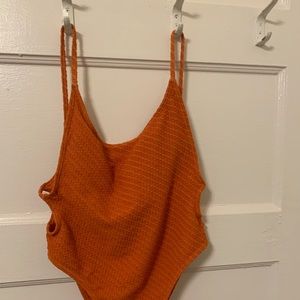 Orange one piece suit